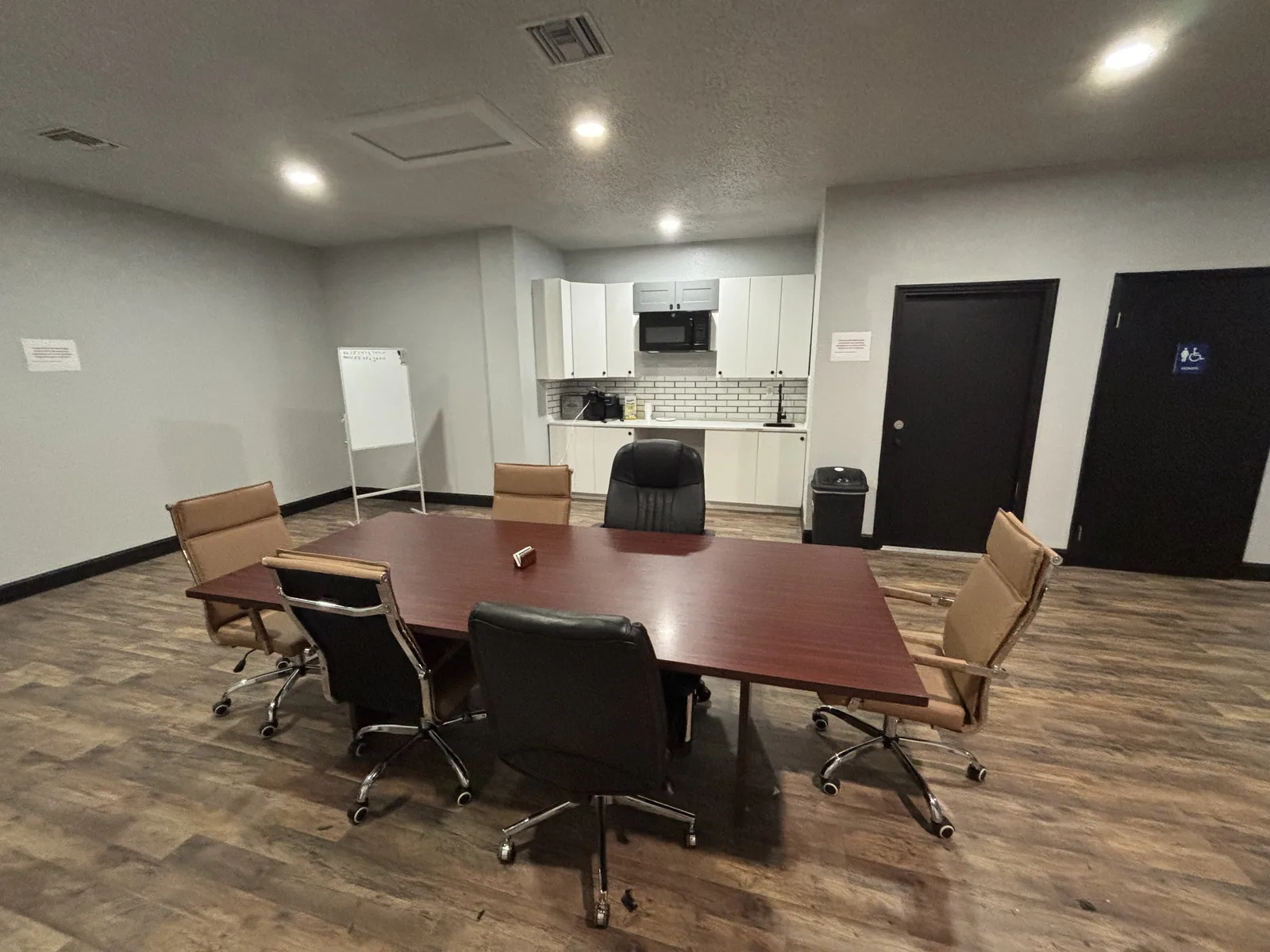 Furnished conference room with seating