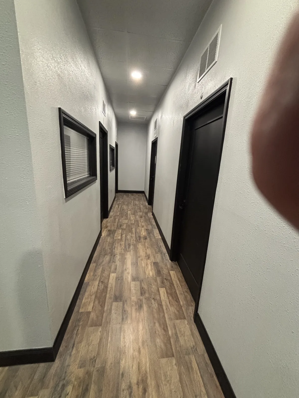 Hallway with interior office windows